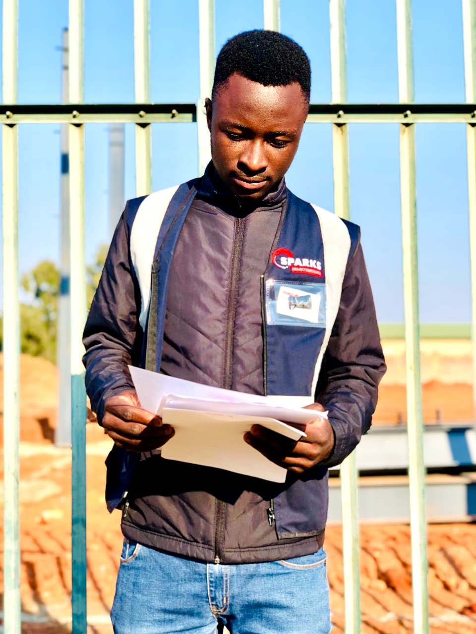 Sparks Projects site supervisor reviewing documents on site